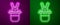 Glowing neon line Magician hat and rabbit icon isolated on purple and green background. Magic trick. Mystery