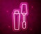 Glowing neon line Mascara brush icon isolated on red background. Vector