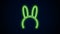 Glowing neon line Mask with long bunny ears icon isolated on black background. 4K Video motion graphic animation