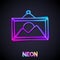 Glowing neon line Picture landscape icon isolated on black background. Vector