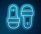 Glowing neon line Sauna slippers icon isolated on blue background. Vector