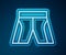 Glowing neon line Short or pants icon isolated on blue background. Vector