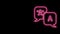 Glowing neon line Translator icon isolated on black background. Foreign language conversation icons in chat speech