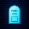 Glowing neon Mail box icon. Post box icon isolated on brick wall background. Vector