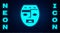 Glowing neon Mexican mayan or aztec mask icon isolated on brick wall background. Vector