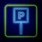 Glowing neon Parking icon isolated on blue background. Street road sign. Vector