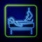 Glowing neon Patient with broken leg is in the hospital icon isolated on blue background. Hospitalization of the patient