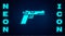 Glowing neon Pistol or gun icon isolated on brick wall background. Police or military handgun. Small firearm. Vector