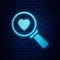 Glowing neon Search heart and love icon isolated on brick wall background. Magnifying glass with heart inside. Vector