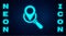 Glowing neon Search location icon isolated on brick wall background. Magnifying glass with pointer sign. Vector