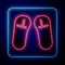 Glowing neon Slipper icon isolated on blue background. Flip flops sign. Vector Illustration