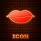 Glowing neon Smiling lips icon isolated on brick wall background. Smile symbol. Vector
