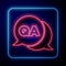 Glowing neon Speech bubbles with Question and Answer icon isolated on blue background. Q and A symbol. FAQ sign. Chat