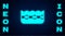 Glowing neon Swimming pool icon isolated on brick wall background. Vector