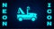 Glowing neon Tow truck icon isolated on brick wall background. Vector
