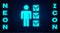 Glowing neon User of man in business suit icon isolated on brick wall background. Business avatar symbol user profile