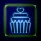 Glowing neon Wedding cake with heart icon isolated on blue background. Vector