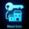 Glowing neon Winning house with key icon isolated on brick wall background. Vector