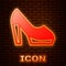 Glowing neon Woman shoe with high heel icon isolated on brick wall background. Vector