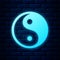 Glowing neon Yin Yang symbol of harmony and balance icon isolated on brick wall background