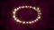 Glowing oval of fairy lights on pink background