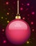 Glowing pink Christmas bauble hanging on beads