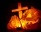 Glowing pumpkin with cross