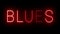 Glowing red retro neon sign for BLUES