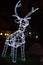 Glowing reindeer made of wire and light bulbs