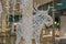 Glowing reindeer made of wire and light bulbs in shopping mall