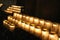 Glowing row of votive candles,Notre Dame Cathedral, Paris