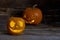 Glowing scary face made of pumpkin.