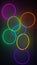 Glowing set of interconnected neon circles of different colors, rendered image.
