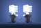 Glowing spiral light bulb characters handshaking