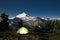 Glowing tent at night beneath Mount Baker, Washington state