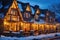 glowing windows of a warm mountain inn at twilight