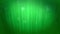 Glowing winter green background with snowfall and rays like the northern lights. Use it as a winter background with