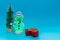 Glows in the dark snowman, presents and Christmas tree with copy space.new year celebration