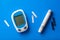 Glucometer ketometer lancet and strips for self-monitoring of blood glucose or ketones level. diabetes or keto diet