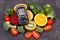 Glucometer with result of sugar level and fruits with vegetables, diabetes and nutritious dessert containing minerals and vitamins