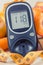 Glucometer, tape measure and fresh natural fruits containing vitamins for healthy lifestyles of diabetics