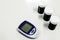 The glucometer, test strips,