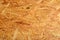 Glued wood chip texture. Wooden board texture