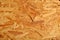 Glued wood chip texture. Wooden board texture