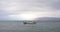 Glum cloudy sky and lake water wave and ship boat landscape veiw