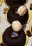 Gluten free brownies, dab of chocolate fudge, with vanilla creme cookies