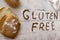 Gluten free concept. Wooden table with flour and pastry material,