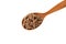 Gluten free flax pasta in wooden spoon on white background, close-up. Uncooked Fusilli made of flaxseed flour. Pasta di Lino.