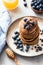 Gluten free oat pancakes with blueberries and chocolate