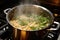 gluten-free pasta boiling in a pot with steam rising